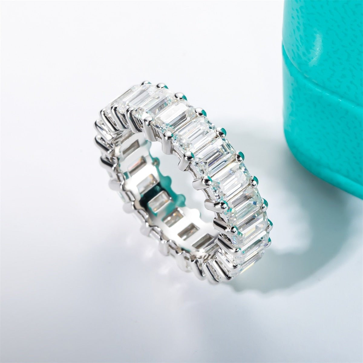 Emerald moissanite store eternity band