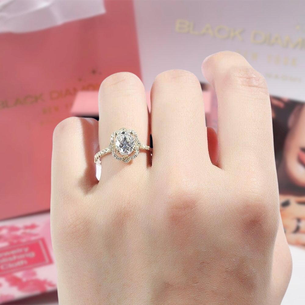 Oval halo engagement rings yellow gold clearance
