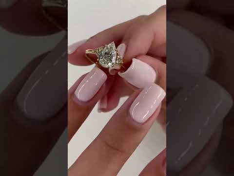 Pear Cut Diamonds Engagement Ring